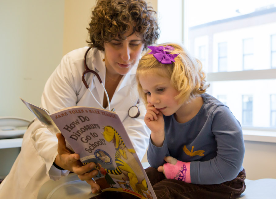 Doctor Reading to a small child
